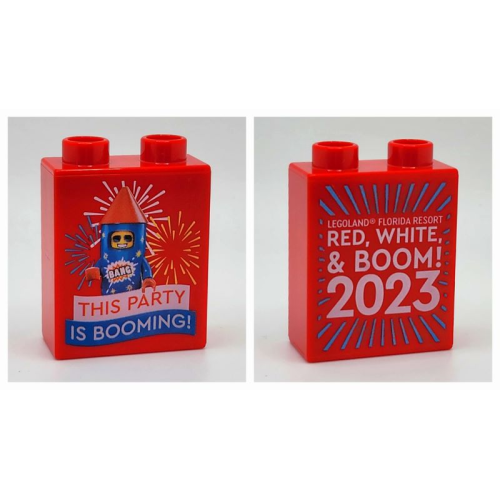 Деталь LEGO 4066pb809 Duplo, Brick 1 x 2 x 2 with 'THIS PARTY IS BOOMING!' and 'RED, WHITE, & BOOM! 2023' LEGOLAND Florida Resort Pattern