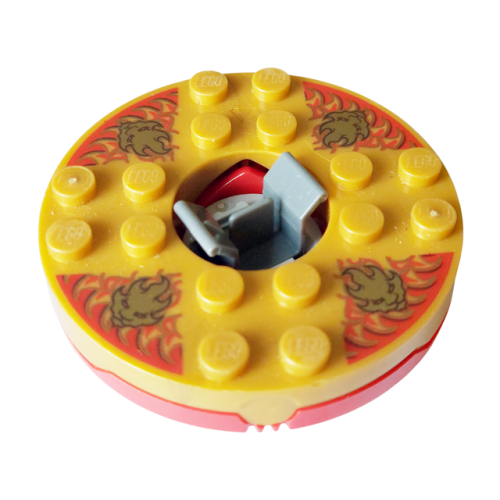 Деталь LEGO 92549c04pb01 Turntable 6 x 6 x 1 1/3 Round Base with Pearl Gold Top with Gold Faces on Red Pattern (Ninjago Spinner)
