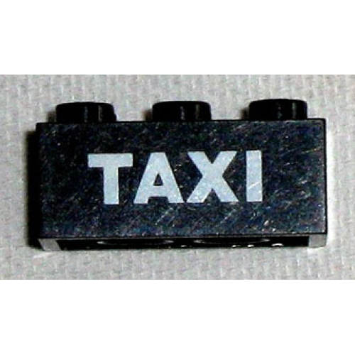 Деталь LEGO 3002oldpb04 Brick 2 x 3 with White 'TAXI' Sans-Serif Pattern