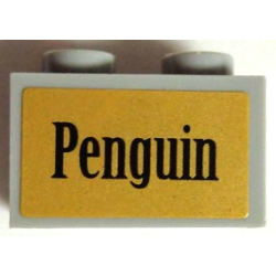 Technic, Brick 1 x 2 with Axle Hole with Black 'Penguin' on Gold Background Pattern (Sticker) - Set 7785 Technic, Brick 1 x 2 with Axle Hole with Black 'Penguin' on Gold Background Pattern (Sticker) - Set 7785