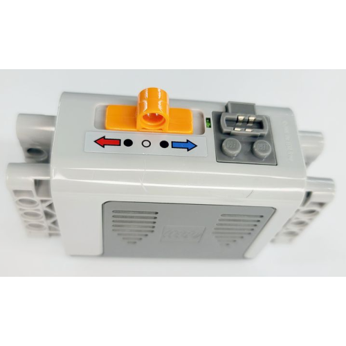 Деталь LEGO 59510c01pb09 Electric 9V Battery Box 4 x 11 x 7 PF with Blue and Red Long Arrows on Light Bluish Gray Background Pattern (Sticker) - Set 8109