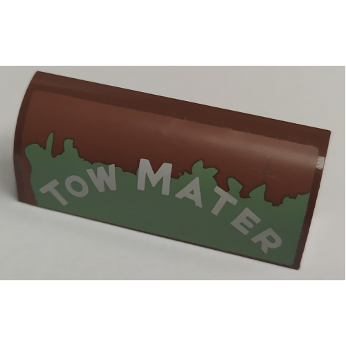 Деталь LEGO 6191pb030R Slope, Curved 1 x 4 x 1 1/3 with White 'TOW MATER' on Worn Sand Green Background Pattern Model Right Side (Sticker) - Set 8677