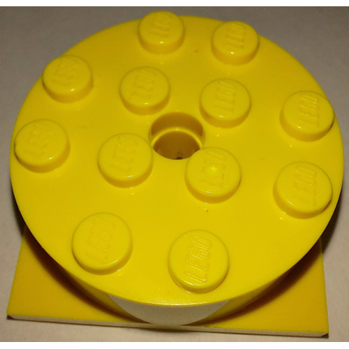 Деталь LEGO 87081c04 Turntable 4 x 4 x 1 1/3 with Yellow Square Base, Locking (87081 / 61485) - Yellow