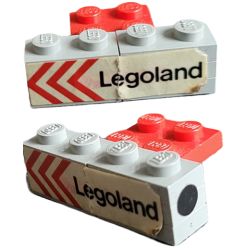 Stickered Assembly 4 x 3 x 1 with 'Legoland' and Red Chevrons on Side and Black Dot Pattern on Both Ends Model Left Side (Stickers) - Set 687 - 2 Plate 1 x 1, 4 Plate 1 x 2, 1 Plate 2 x 3 Stickered Assembly 4 x 3 x 1 with 'Legoland' and Red Chevrons on Side and Black Dot Pattern on Both Ends Model Left Side (Stickers) - Set 687 - 2 Plate 1 x 1, 4 Plate 1 x 2, 1 Plate 2 x 3