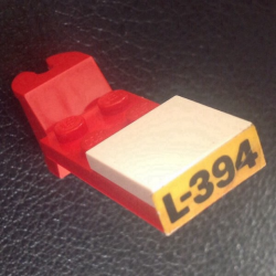 Stickered Assembly 5 x 2 x 2/3 with Black 'L-394' on Yellow Background Pattern (Sticker) - Set 394 - 1 Tile 2 x 2, 1 Hinge Plate 2 x 4 Articulated