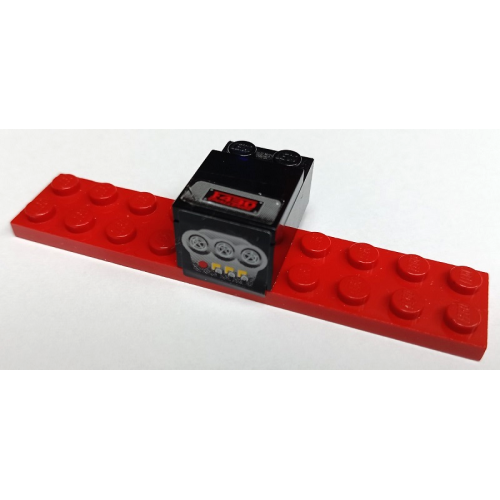Деталь LEGO BA369pb01 Stickered Assembly 10 x 3 x 1 2/3 with Ferrari Centre Console with Red 'F430 CHALLENGE', Yellow Buttons, Switches and Air Vents Pattern (Stickers) - Set 8143 - 1 Plate 2 x 10, 1 Brick 2 x 3, 1 Tile 2 x 2