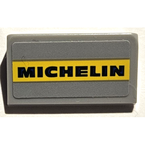 Деталь LEGO 85984pb424 Slope 30 1 x 2 x 2/3 with 'MICHELIN' on Yellow Stripe Pattern (Sticker) - Set 75889