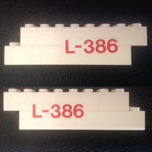 Деталь LEGO BA161pb01 Stickered Assembly 9 x 2 x 2 with Red 'L-386' Pattern on Both Sides (Stickers) - Sets 386 / 770 - 2 Brick 2 x 8