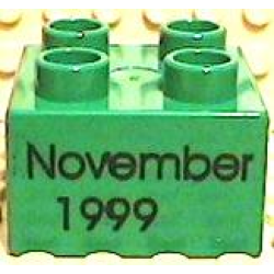 Duplo, Brick 2 x 2 with Black 'November 1999' Pattern - Green Duplo, Brick 2 x 2 with Black 'November 1999' Pattern - Green