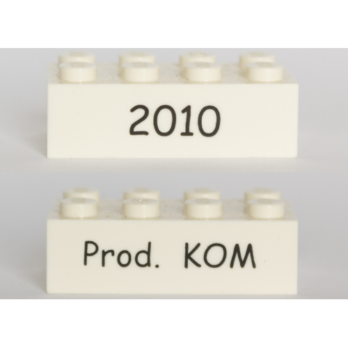 Деталь LEGO 3001pb196 Brick 2 x 4 with Black '2010' and 'Prod. KOM' Pattern on Opposite Sides (Kornmarken Factory Tour)