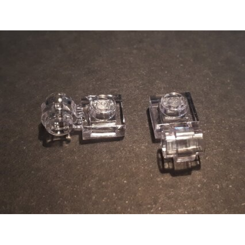 Деталь LEGO 4081b Plate, Modified 1 x 1 with Light Attachment - Thick Ring - Trans-Clear